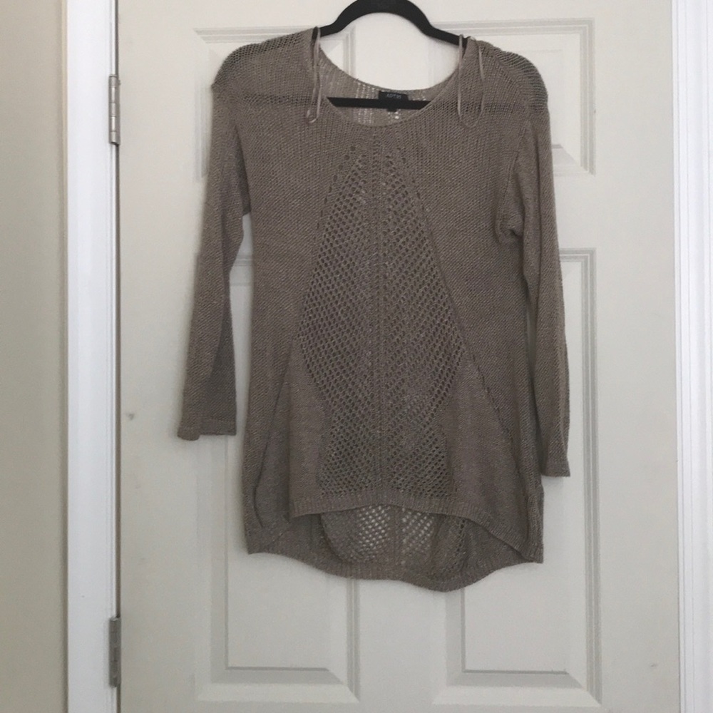 Quarter length holy sweater